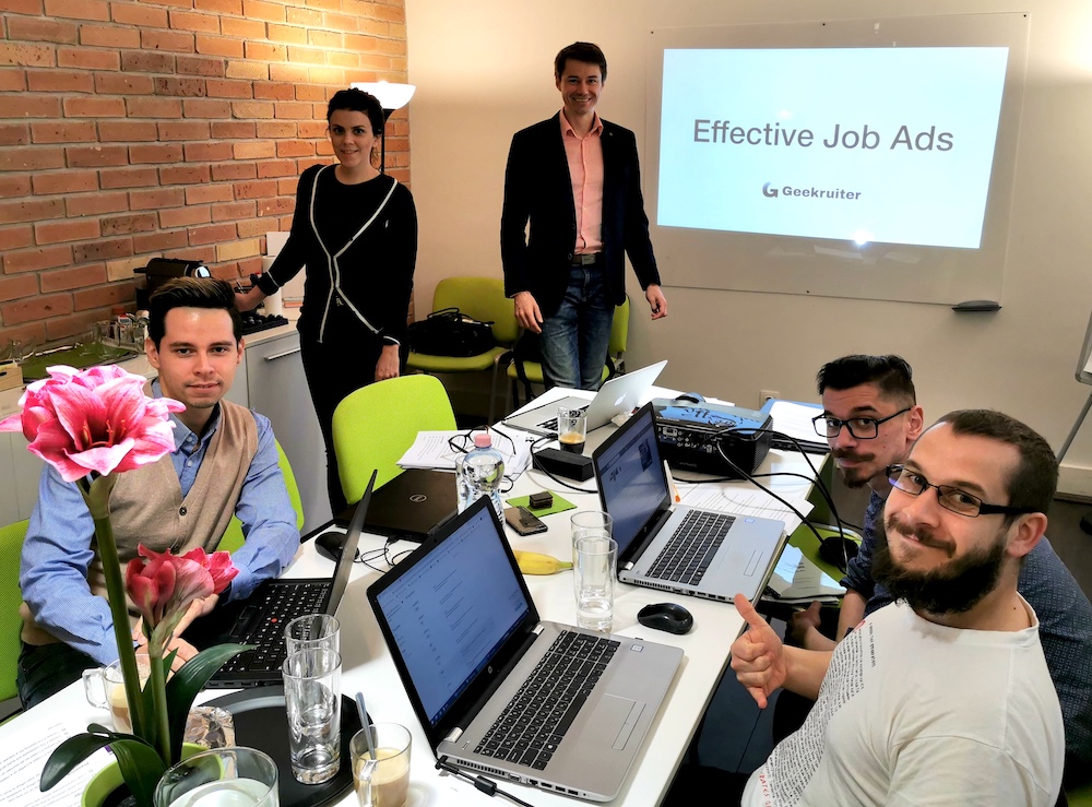 Michal consulting with a team